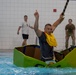 Sink or win: 22nd OSS flights compete in cardboard boat race