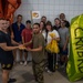 Sink or win: 22nd OSS flights compete in cardboard boat race