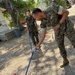 U.S. Navy Sailors participate in snake handlers course