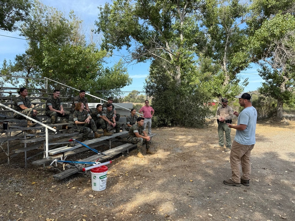 U.S. Navy Sailors participate in snake handlers course