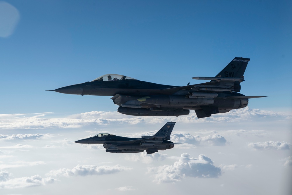 When the Dust Settles: Stratotanker Crew Refuels Falcons in the Desert