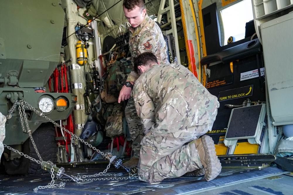 Arctic Edge 25: 27 SOW MC-130 Commando II loads Marine Corps Vehicle