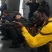 Sailors aboard the USS John Finn conduct a weapons familiarization course in the South China Sea