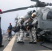 Sailors aboard the USS John Finn conduct a crash and salvage drill in the South China Sea