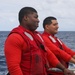 Sailors aboard the USS John Finn conduct flight quarters in the South China Sea