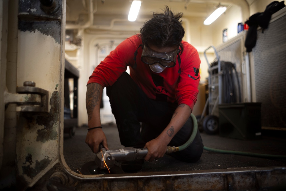 USS Gerald R. Ford (CVN 78) Sailor Conducts Maintenance