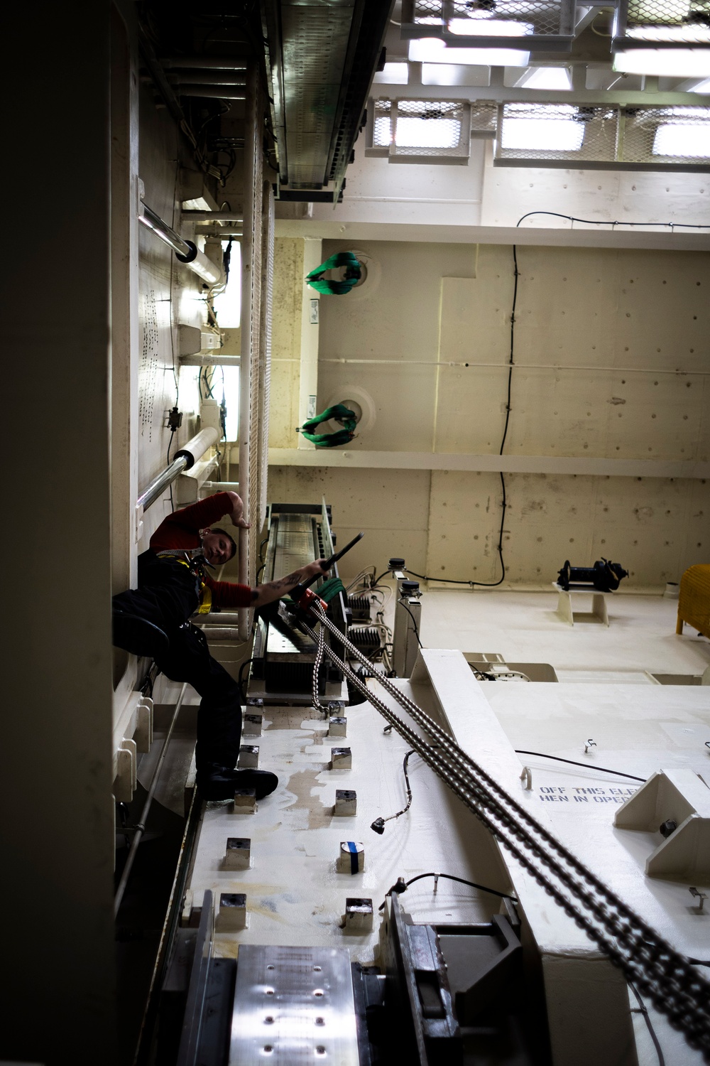 USS Gerald R. Ford (CVN 78) Sailor Conducts Maintenance