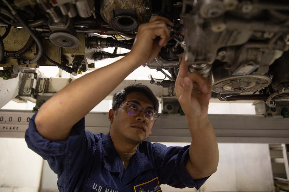USS Gerald R. Ford (CVN 78) Sailor Conducts Maintenance