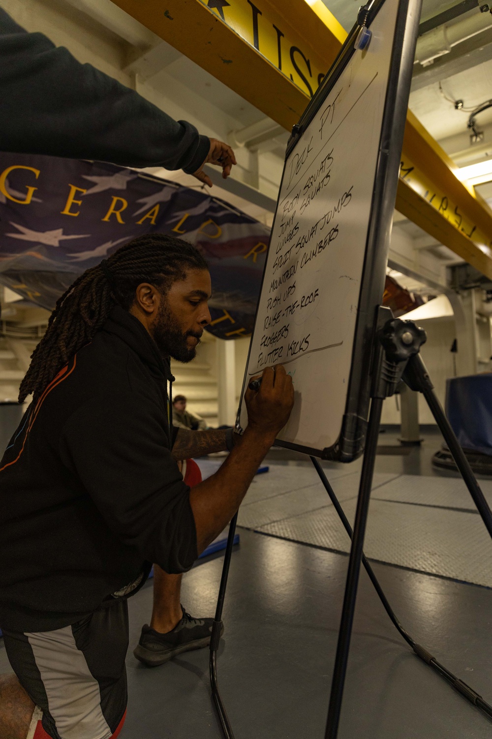 USS Gerald R. Ford (CVN 78) Sailors Conduct Physical Fitness Training