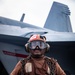 VFA-87 Sailor Chains Aircraft on Flight Deck