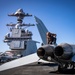 VFA-87 Sailor Inspects Jet