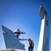 USS Gerald R. Ford (CVN 78) Sailor Inspects Jet