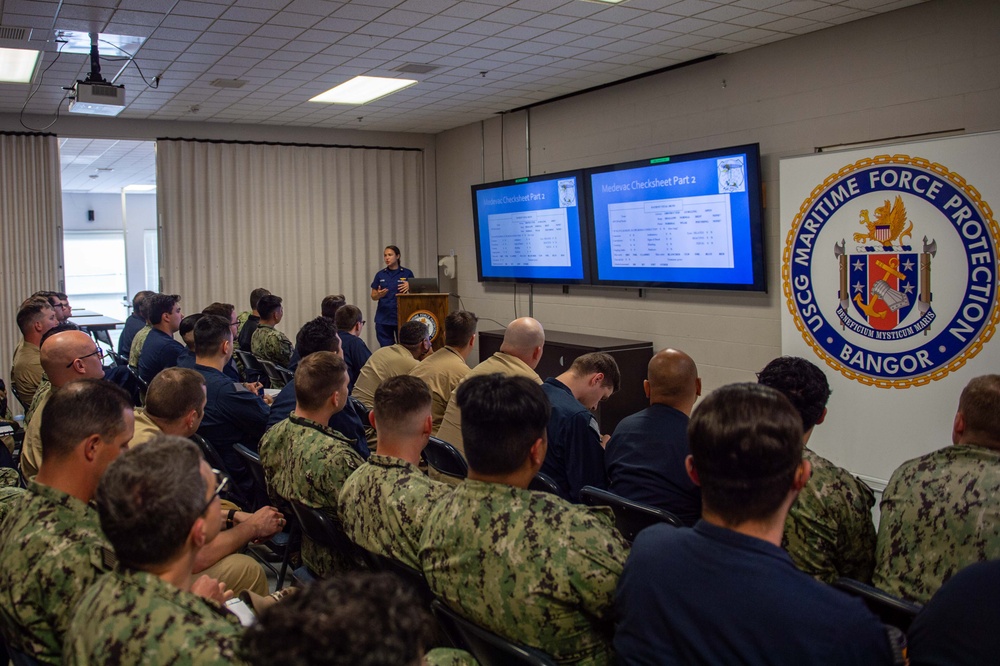 Submarine Sailors and Coast Guardsmen Complete MEDEVAC Training
