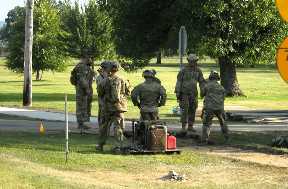279th Engineer Utilities Detachment puts finishing touches on 2025 sidewalk troop project at Fort McCoy