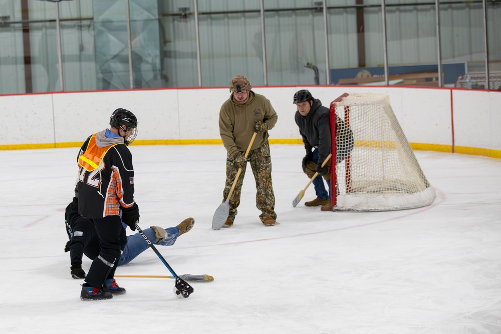 Soldiers Compete in Broomball