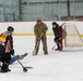 Soldiers Compete in Broomball