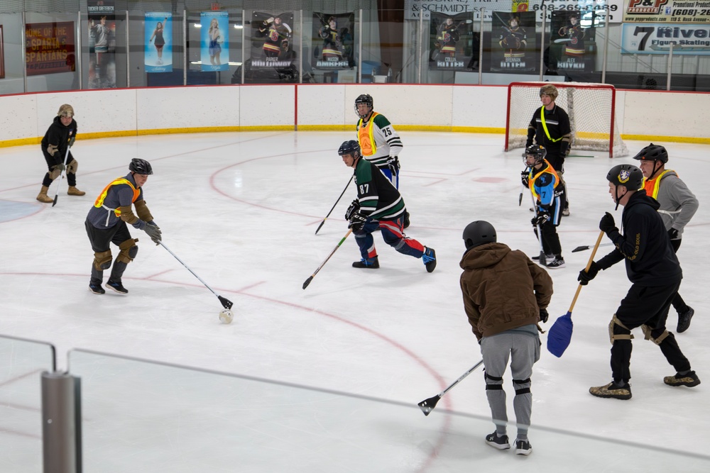Soldiers Compete in Broomball