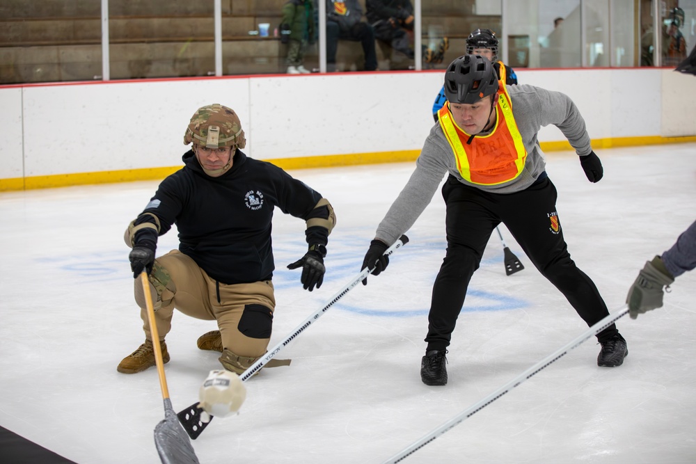 Soldiers Compete in Broomball