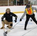 Soldiers Compete in Broomball