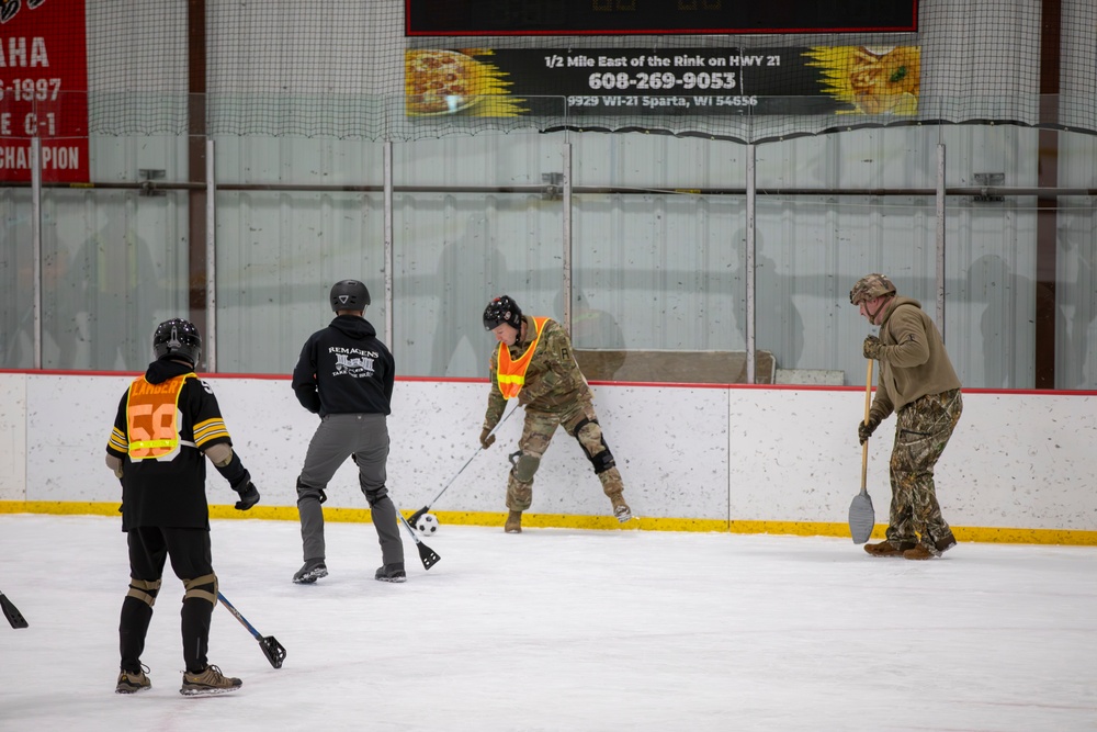 Soldiers Compete in Broomball
