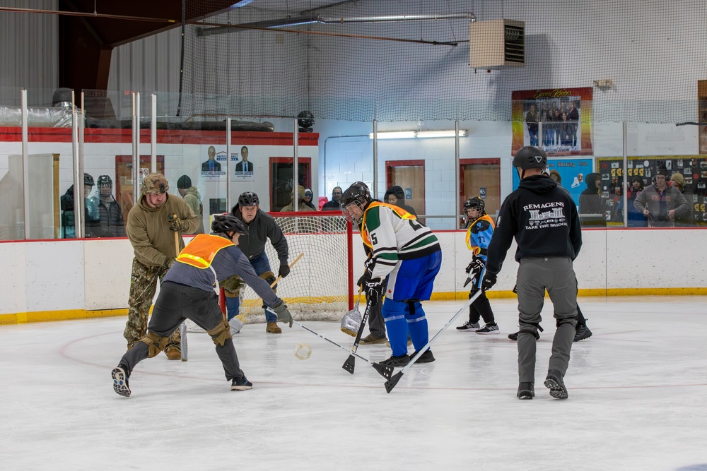 Soldiers Compete in Broomball
