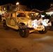 Soldiers Drive HMMWV in Parade