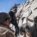 V35 and V11 Marines conduct mock lead climbing during Assault Climbers Course