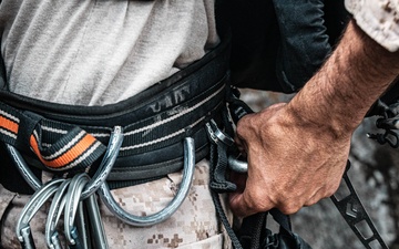 V35 and V11 Marines conduct mock lead climbing during Assault Climbers Course