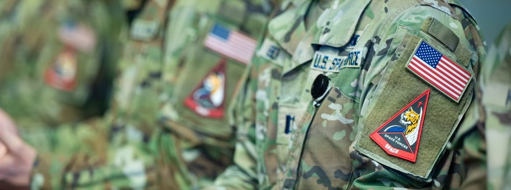 Space Operations Command Guardians Wear Red Patches, Signifying Warfighting Focus