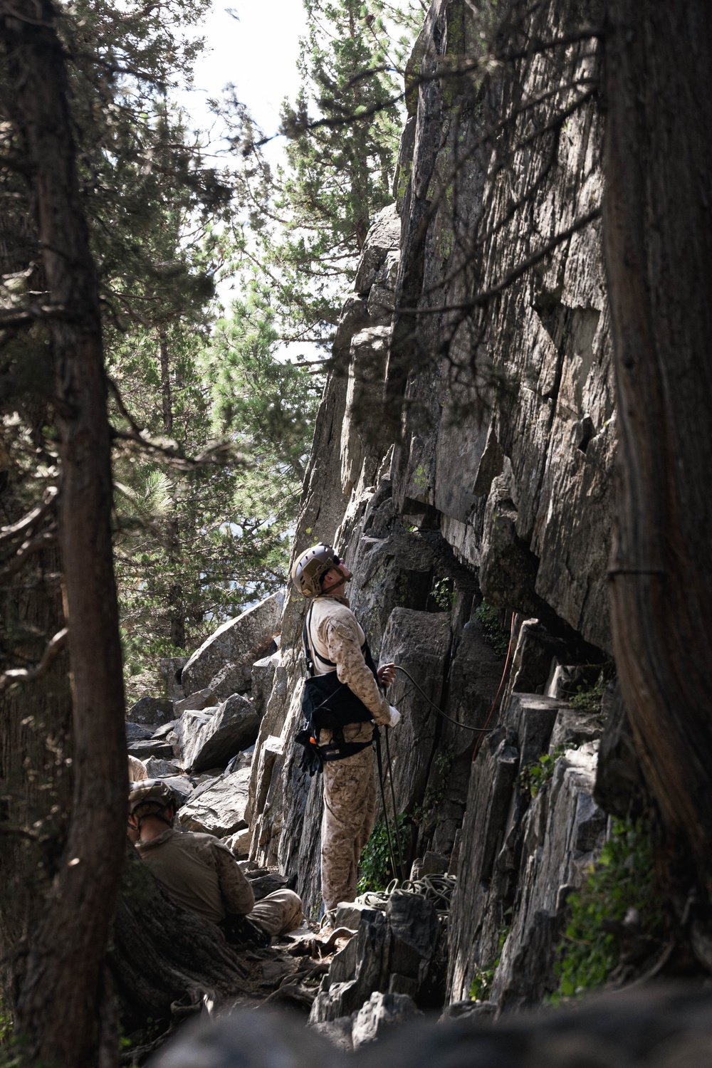V35 and V11 Marines conduct mock lead climbing during Assault Climbers Course