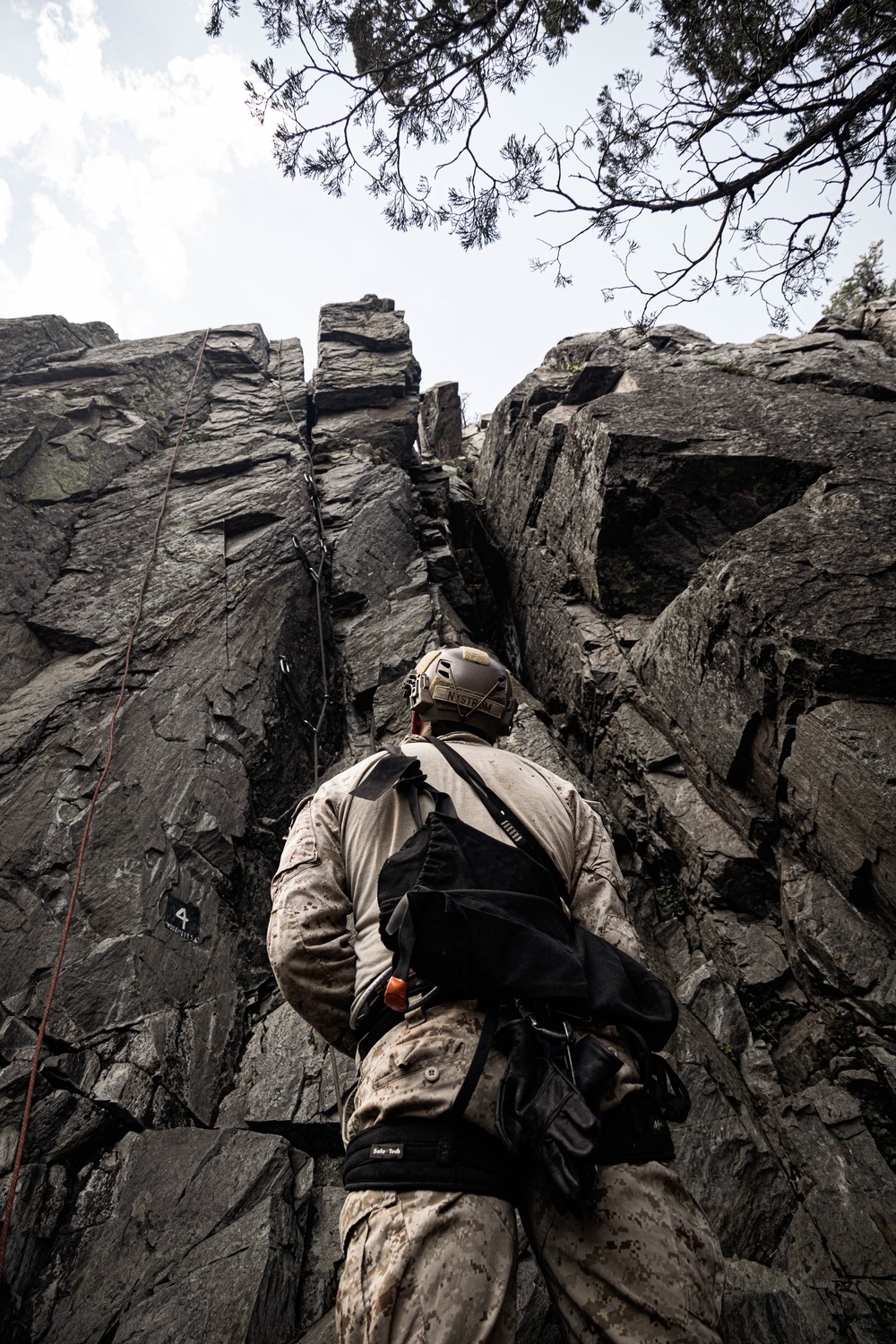 V35 and V11 Marines conduct mock lead climbing during Assault Climbers Course