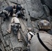 V35 and V11 Marines conduct mock lead climbing during Assault Climbers Course