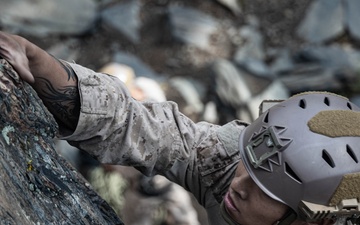 V35 and V11 Marines conduct mock lead climbing during Assault Climbers Course