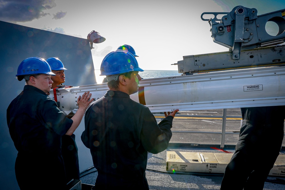 USS Iwo Jima Sailors Load a Rim-7 Sea Sparrow