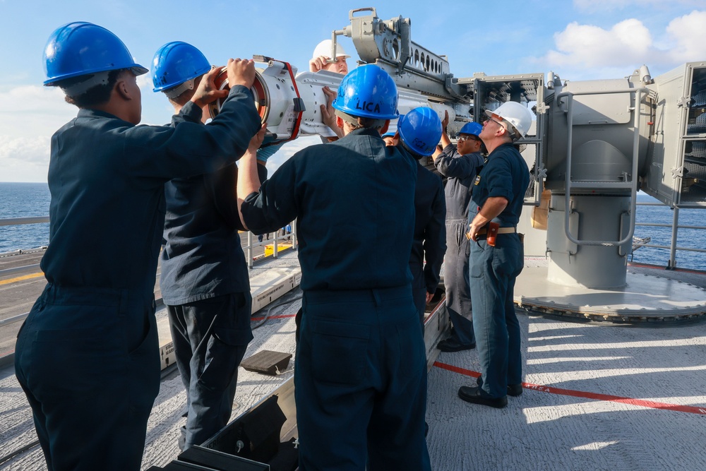 USS Iwo Jima Sailors Load a Rim-7 Sea Sparrow