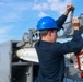 USS Iwo Jima Sailors Load a Rim-7 Sea Sparrow