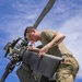 U.S. Army Soldier conducts maintenance on the rear tail blade of a UH-60 Blackhawk