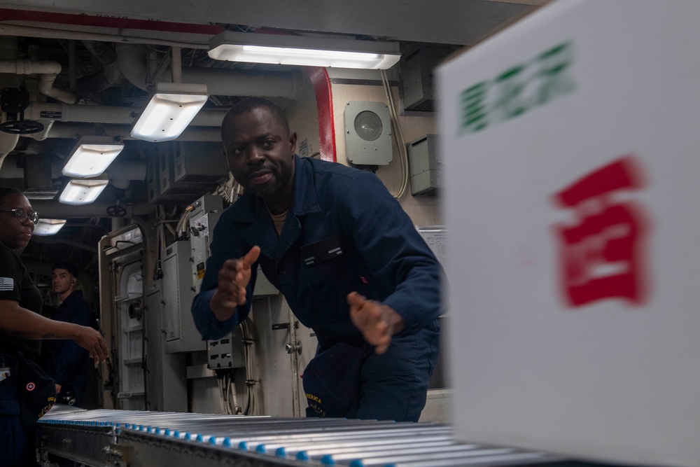USS America (LHA 6) Conducts Stores Onload