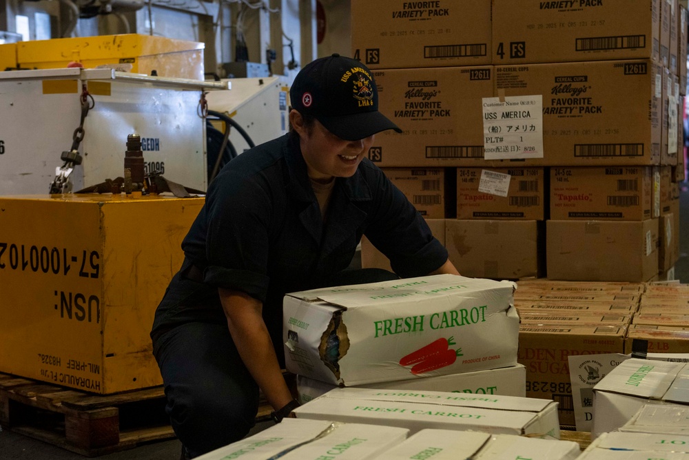 USS America (LHA 6) Conducts Stores Onload