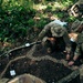 U.S. Army Soldiers create a terrain model prepping for a Jungle Field Training Exercise