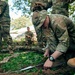 U.S. Army Soldiers create a terrain model prepping for a Jungle Field Training Exercise