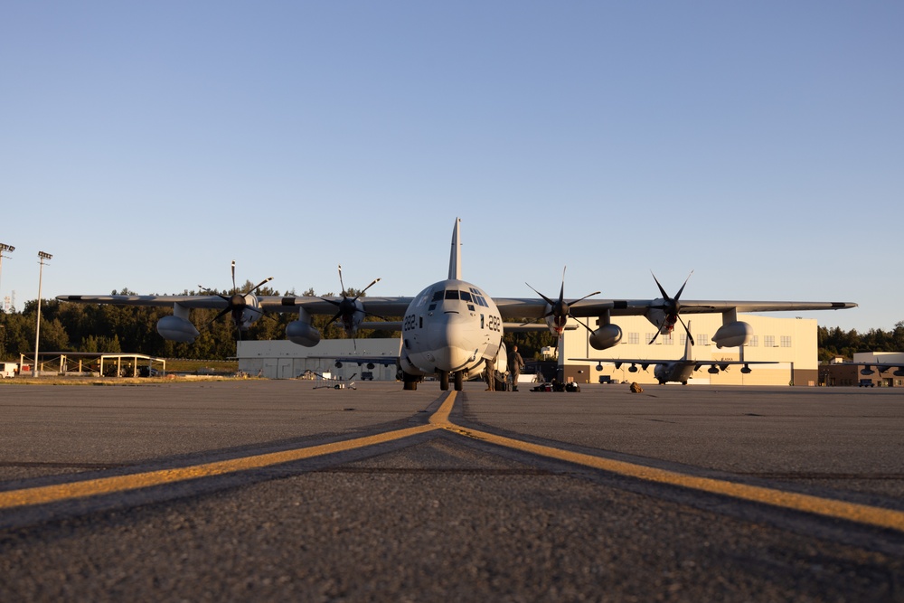 U.S. Marines with VMGR-252 load and offload HIMARS