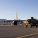U.S. Marines with VMGR-252 load and offload HIMARS