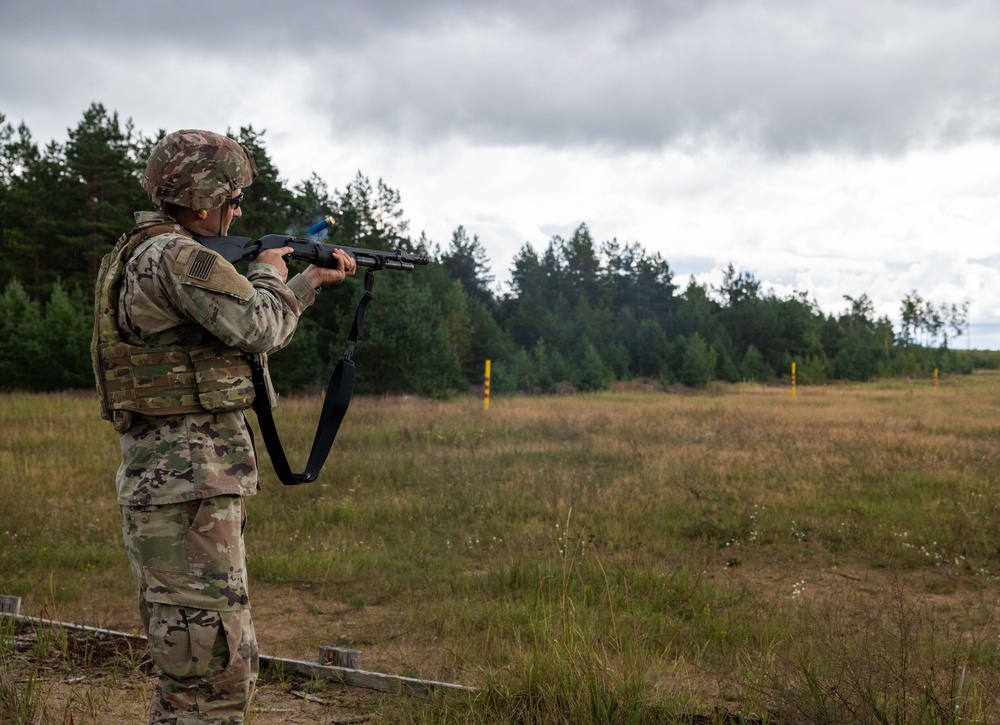 U.S. Soldier tries out Estonian shot gun at dual training