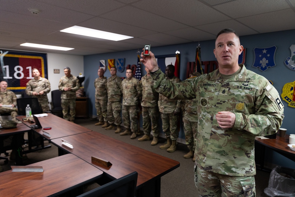 Division West Awards Coins to 181st MFTB