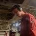 DC3 Luke Bryant reviews instructions prior to an internal fuel transfer alignment