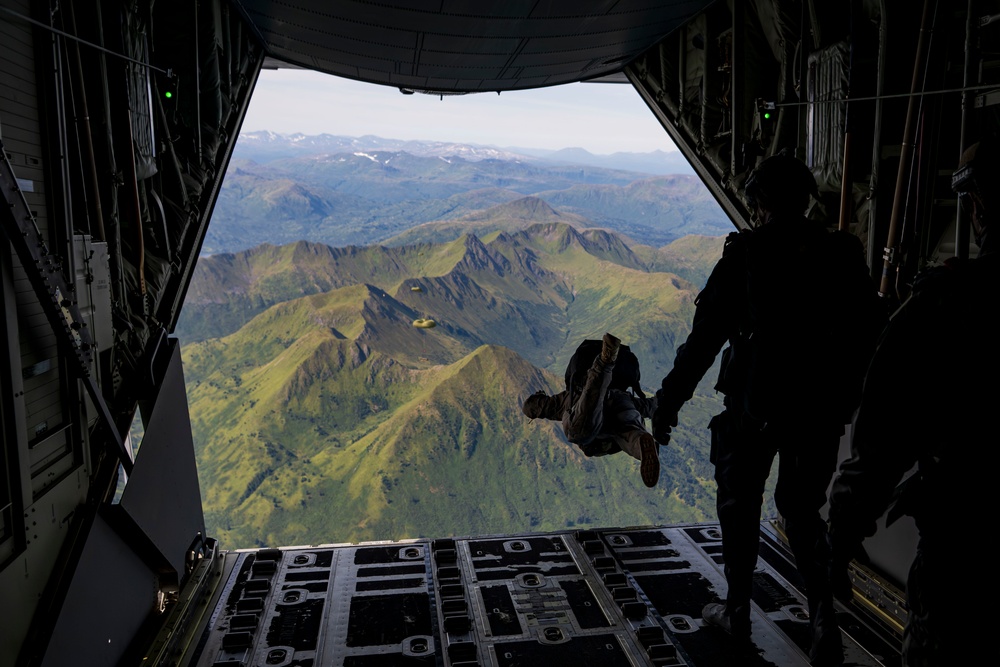 NSWG2 personnel execute a military free fall and CRRC drop during AE25