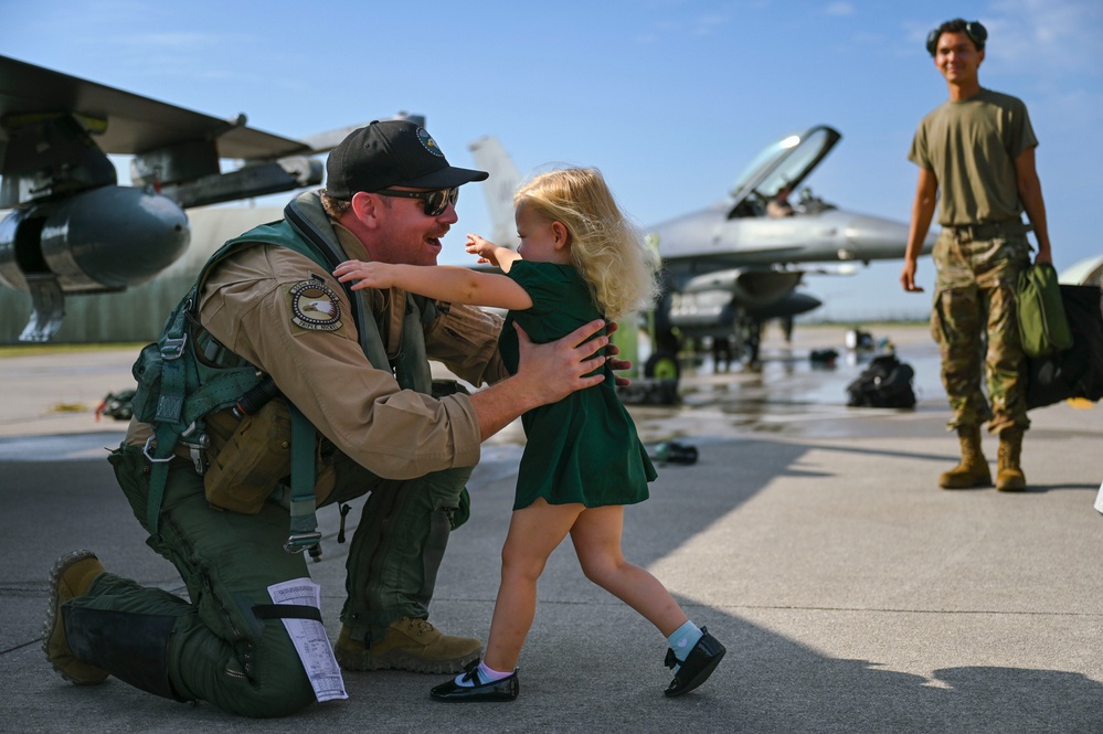 Friends and family welcome 555th FS pilots home