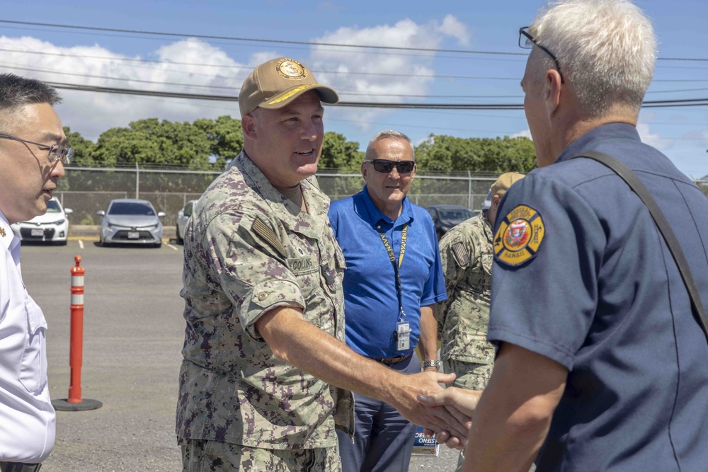 Rear Adm. Brad Collins visits CNRH Federal Fire Department Headquarters
