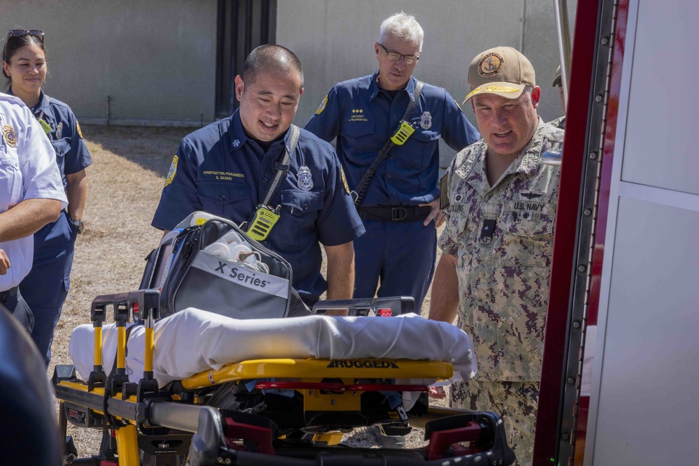 Rear Adm. Brad Collins visits CNRH Federal Fire Department Headquarters